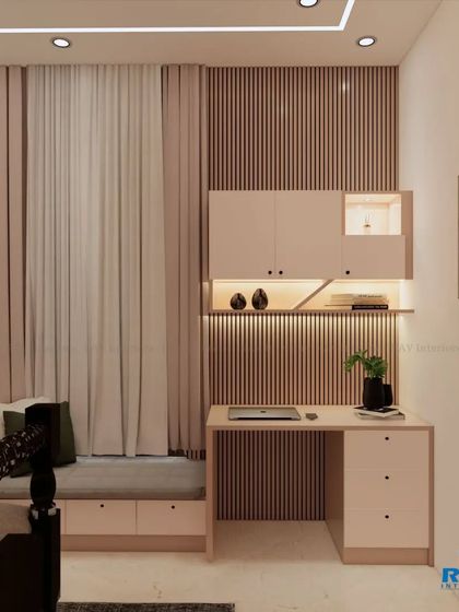 This bedroom includes a cozy window seat and a study desk with overhead storage, making it a perfect room for a teenager.