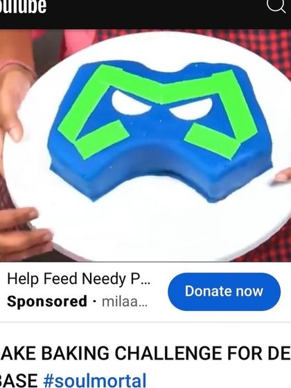 A close-up of the finished 3D gamer logo cake, as seen on the popular YouTube stream which garnered over 7 million views.