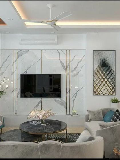 The proposed design for the TV wall, featuring a seamless marble-finish panel that cleverly camouflages the kitchen and toilet doors, creating a clean and uninterrupted aesthetic.