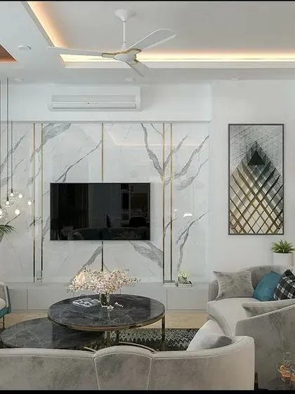 The proposed design for the TV wall, featuring a seamless marble-finish panel that cleverly camouflages the kitchen and toilet doors, creating a clean and uninterrupted aesthetic.