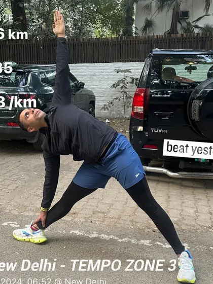 A post-run stretch after a Zone 3 tempo session. We always finish with proper cool-downs to aid recovery.