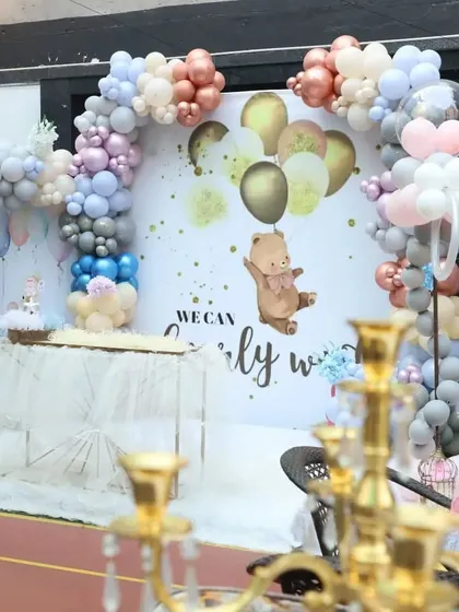 A stunning backdrop for a teddy bear theme, showing how I can customize the space for any creative idea. The balloon arrangements and cake table are set up for a perfect photo opportunity.