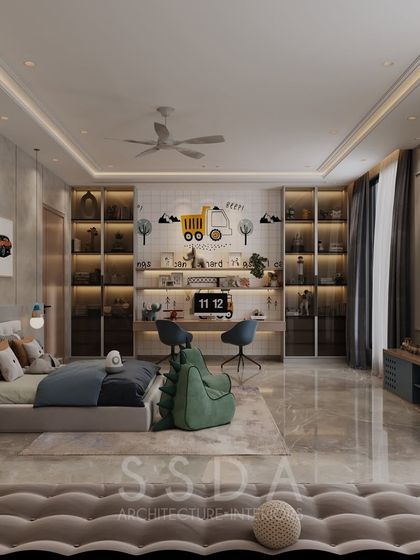 The study area in the kids' bedroom features a large desk with a hand-painted mural backdrop. The built-in shelving with integrated lighting is perfect for displaying books and toys.