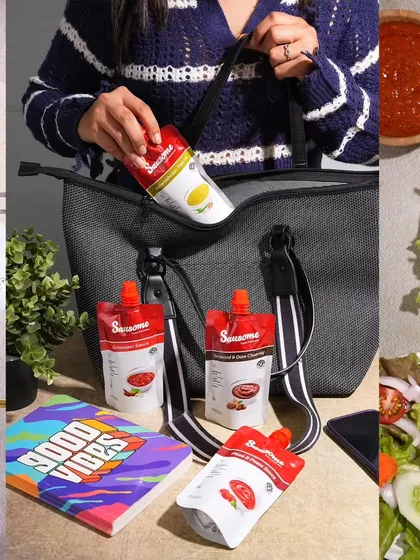 Product photography should tell a story. Here, I styled these convenient sauce pouches to show them in a real-life context, ready to be packed in a bag for a meal on the go. This lifestyle approach helps customers visualize using the product themselves.