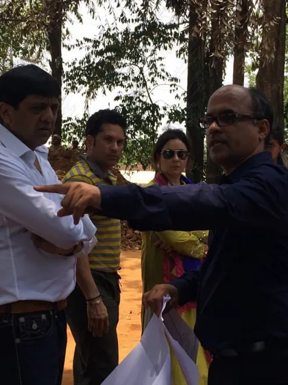 We believe in a deeply collaborative process with our clients. Here, we are on-site discussing the design for a bespoke private residence with our esteemed client, Sachin Tendulkar.