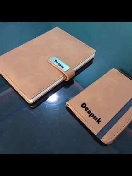 A matching set for the organized traveler, this combo includes a personalized passport holder and a diary, both in a classic tan leather finish with name engraving.