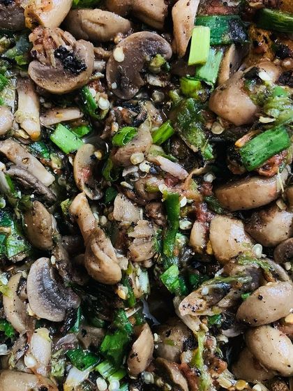 A close-up of the button mushroom chutney. You can see all the different ingredients mashed together.