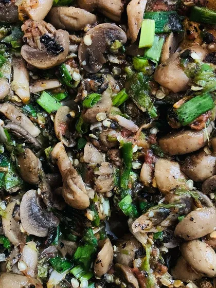 A close-up of the button mushroom chutney. You can see all the different ingredients mashed together.
