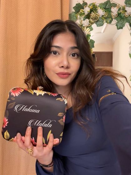 A closer look at my customized "Hakuna Matata" clutch. A personal touch like this makes an accessory truly special.