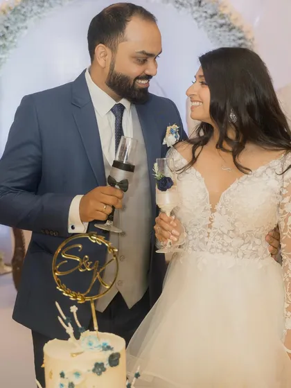 A celebratory moment for the couple as they toast to their new life together.