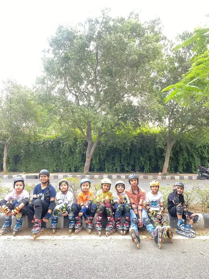 Our skating crew taking a break during an outdoor session. We believe in learning together and creating lasting friendships.