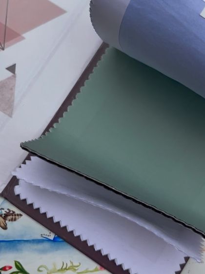 Exploring color and texture combinations for our next collection, pairing a solid green with printed and plain fabrics.