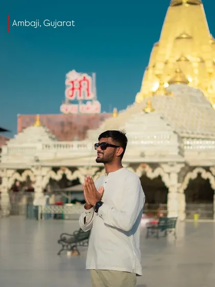 A personal moment of prayer at the Ambaji Temple in Gujarat, feeling grateful to witness the blend of sport and spirituality.
