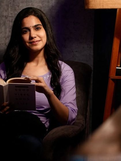 A quiet moment captured on camera. This photo from a lifestyle shoot shows a softer, more introspective character, perfect for projects that require a relatable and calm presence.