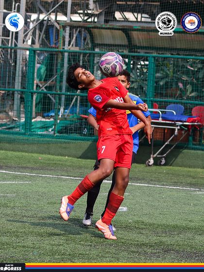 A player expertly controls the ball with his chest. This level of skill is a testament to our structured training curriculum.