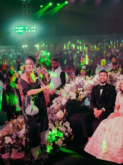 A wide shot showing the scale of a beautiful Sangeet in Jaipur. I love engaging with the couple amidst a sea of their loved ones, making the moment feel both grand and intimate.
