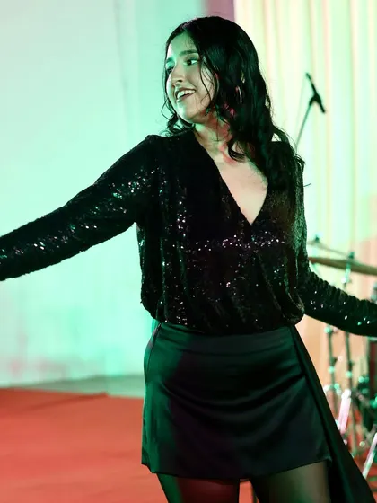 A candid moment of me enjoying the performance. When we're having fun on stage, the audience has fun too.