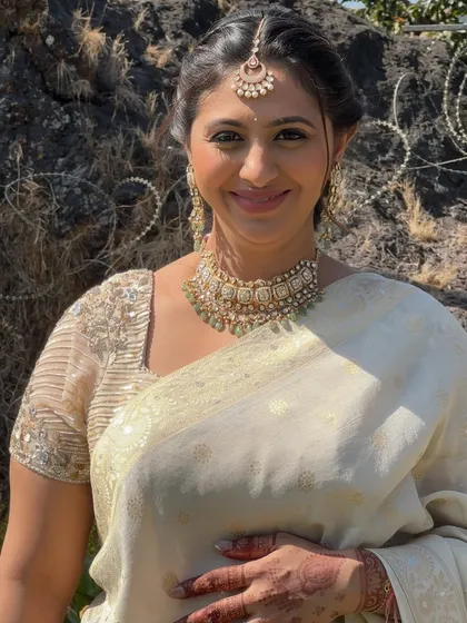 A beautiful, happy portrait of the groom's sister. The makeup enhances her features and gives her a radiant, celebratory glow.