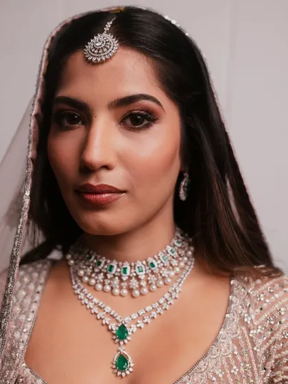 A flawlessly curated modern bridal look. You can learn to achieve this kind of flawless finish in my 2-Month Pro Makeup Course.