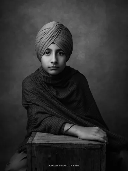 Another classic black and white pose from this session. The composition is simple and strong, focusing all attention on his expressive face.