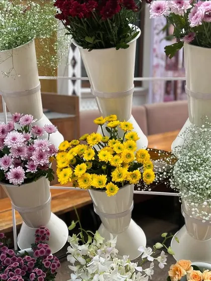 A selection of fresh, vibrant flowers ready for guests to create their own arrangements at the Flower Bar.