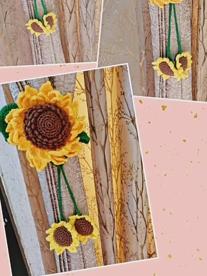 A closer look at the sunflower curtain tie-backs. The design features one large sunflower and two smaller ones, all made with durable and bright cotton yarn.