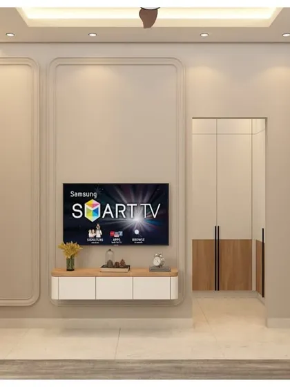 A 3D render of a bedroom TV unit with a simple floating console. The wall behind features classic molding, creating a clean and timeless look that complements the integrated study area.