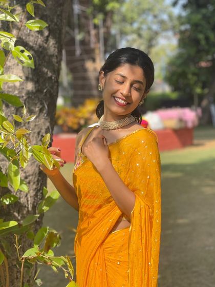 Dressed in a yellow saree for a sunny day event. I love incorporating the beauty of traditional Indian wear into my dance and personal style.