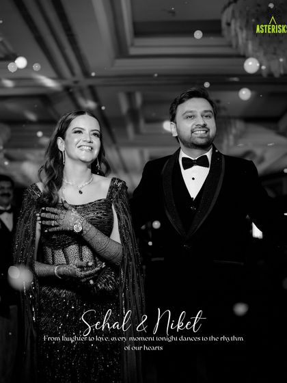A classic black and white portrait of the couple, capturing their happiness and elegance during the Sangeet night.
