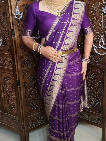 The full look of the body-hugging drape. It's a modern and confident style, perfect for a client who wants to make a statement.