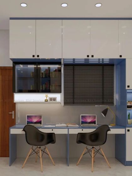 A render of a kids' room with a dual study station, perfect for siblings. The blue and white color scheme is modern and clean.