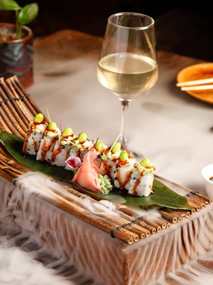 Embark on a culinary odyssey with our creative sushi presentations. Served on a bed of dry ice, every roll tells a story and every bite is a work of art.
