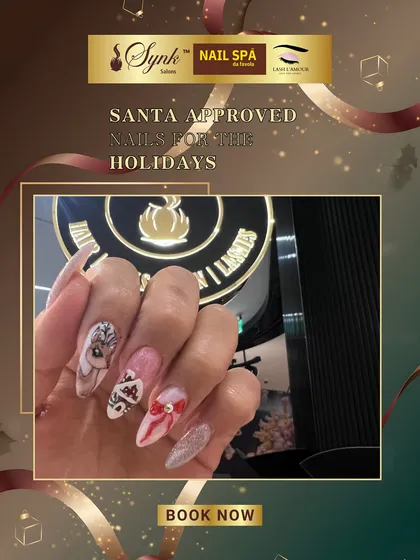 Intricate, Santa-approved holiday nails. This design features detailed Christmas characters and patterns, including bows and festive stripes, perfect for celebrating the season in style.