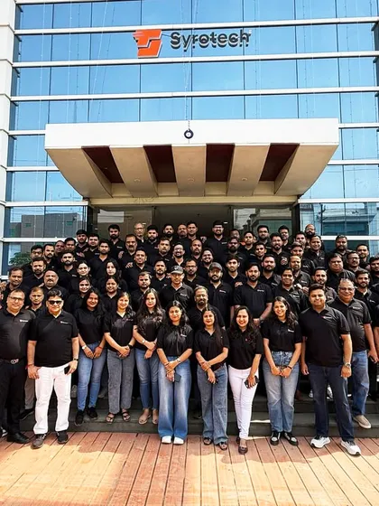 This is the Syrotech family. Our strength isn't just in our technology but in our people. This photo captures our dedicated team outside our corporate office, representing the ambition and teamwork that drive us to build the future of connectivity together.