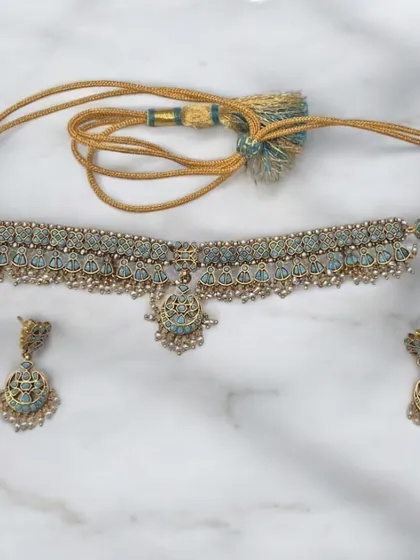 The finished product from my "sketch to reality" post. This stunning choker set features delicate enamel work in a lovely shade of blue, with tiny pearl drops for added elegance.