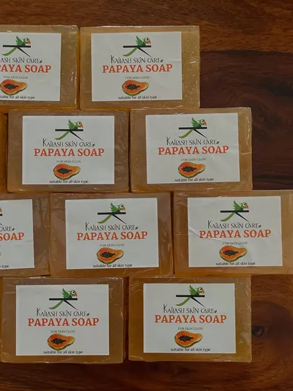 A top-down view of my Papaya soaps, all wrapped and waiting to be packed. I handle every step of the process, from making to dispatching.