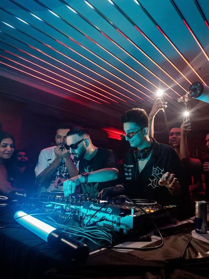 Straight A student, but I’m friends with the cool kids. Vibing with the crew behind the decks.