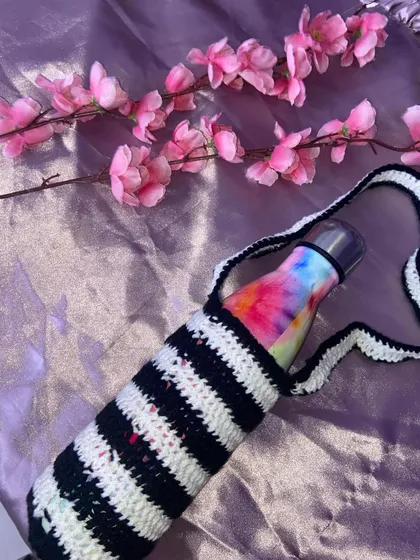 Another shot of the striped bottle cover. It's a fun accessory to make sure you stay hydrated in style.