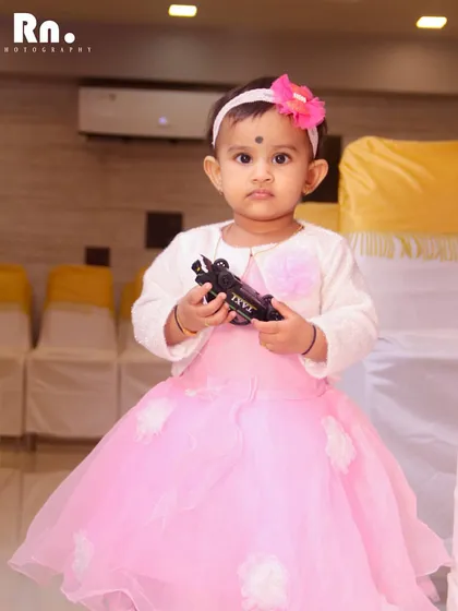 A portrait of the birthday girl during her party. I make sure to get a few lovely posed shots amidst the candid coverage of the event.