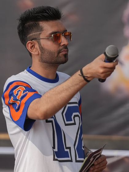 Interacting with the crowd during the racing event, making sure they are as invested in the outcome as the participants.