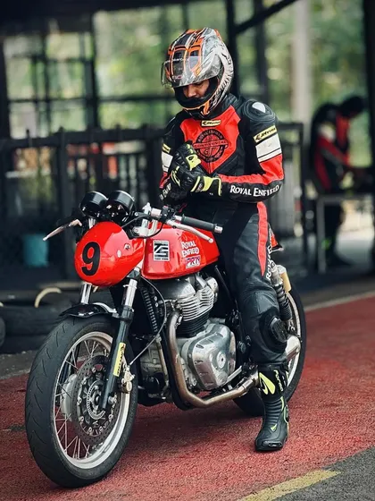 A rider getting ready on his GT 650 in the pit lane. The moments before heading out on track are filled with focus and anticipation.