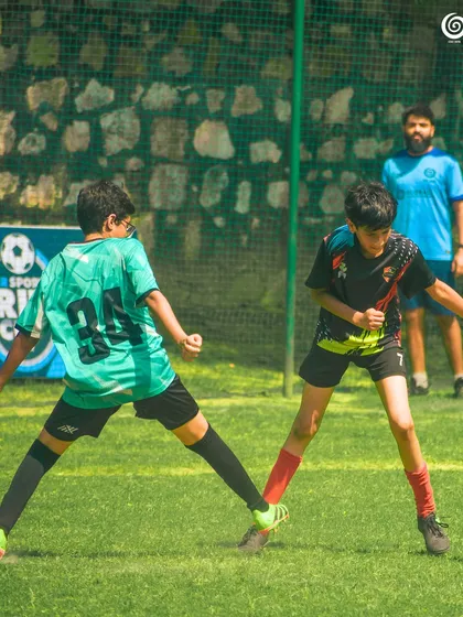 Intense action from our U-11 age group, where players learn to compete and work together as a team.