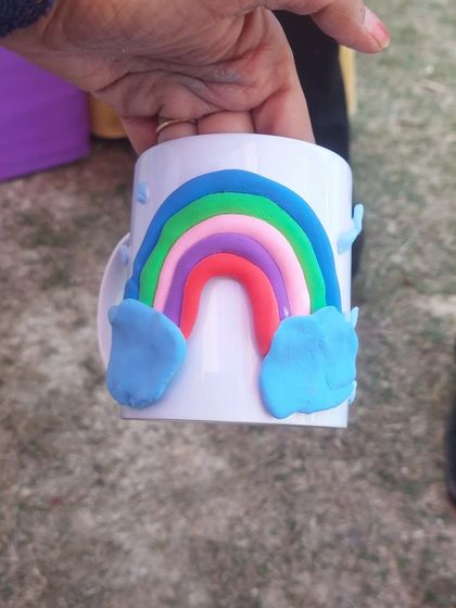 A beautifully finished rainbow mug, crafted with colourful clay. This is a great sensory activity that results in a lovely keepsake.