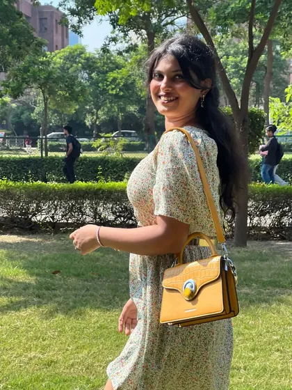 A simple and sweet everyday look. I styled this floral print mini dress with a bright yellow handbag for a pop of color, perfect for a walk in the park or a casual day out.
