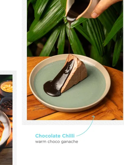 A decadent Chocolate Chilli dessert with warm choco ganache, featured during a special pop-up. The combination of sweet and spicy is a signature element of our inventive culinary style.