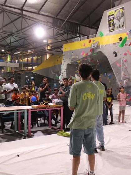 The awards ceremony is a special moment. After a long day of competition, I love bringing all the climbers and their parents together to celebrate the winners and everyone's hard work.