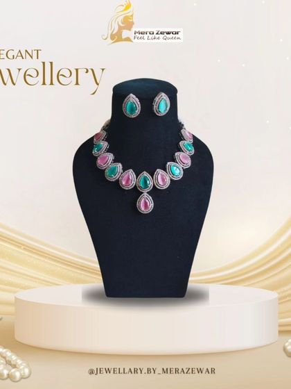 This elegant necklace set features a beautiful combination of pink and green stones. It's a delicate and feminine piece, perfect for festive occasions.