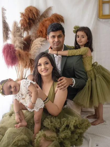 A beautiful family portrait session, coordinated in lovely olive tones. I focus on capturing the genuine connection and love between family members.