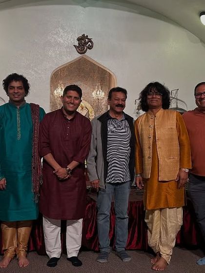 A group photo with the organizers and fellow musicians after our concerts in Brea and Bakersfield, California. Their hospitality made the events truly special.