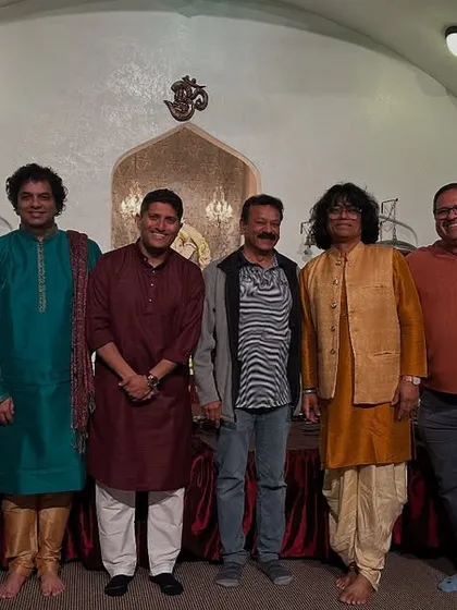 A group photo with the organizers and fellow musicians after our concerts in Brea and Bakersfield, California. Their hospitality made the events truly special.